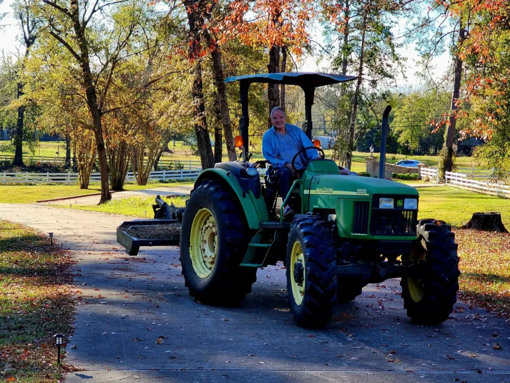 Sell Commercial Property in Gladewater on his tractor